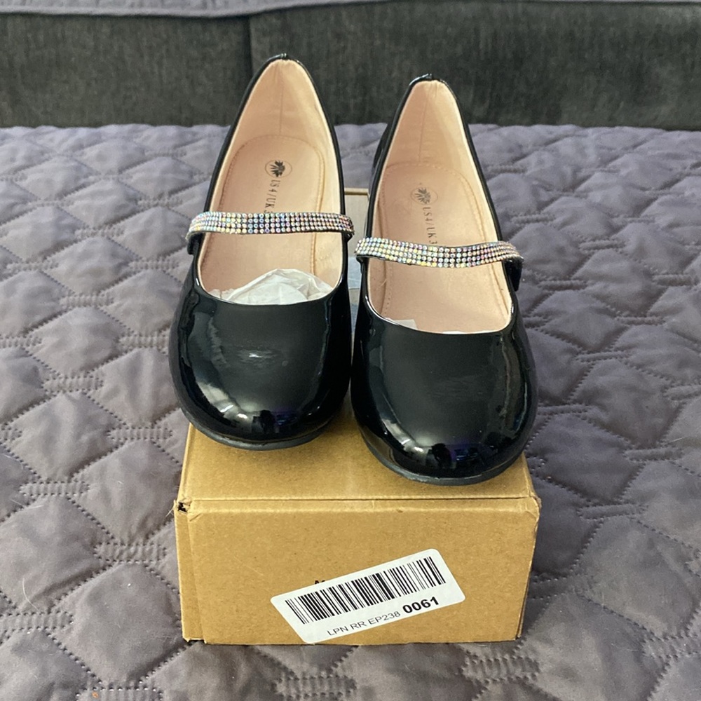 Girls Black Patent Leather Mary Jane Dress Shows With Low Heel.